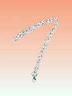 Tour de cou - Fleurs rouge Le Petit Atelier du Calot